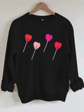 Pink heart-shaped balloon printed sweatshirt
