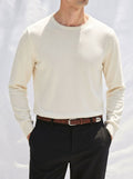 Round neck solid color long sleeved sweater for men