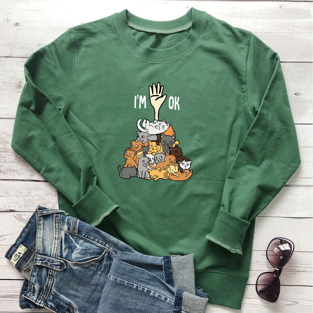 A pile of cat letter printed hoodies