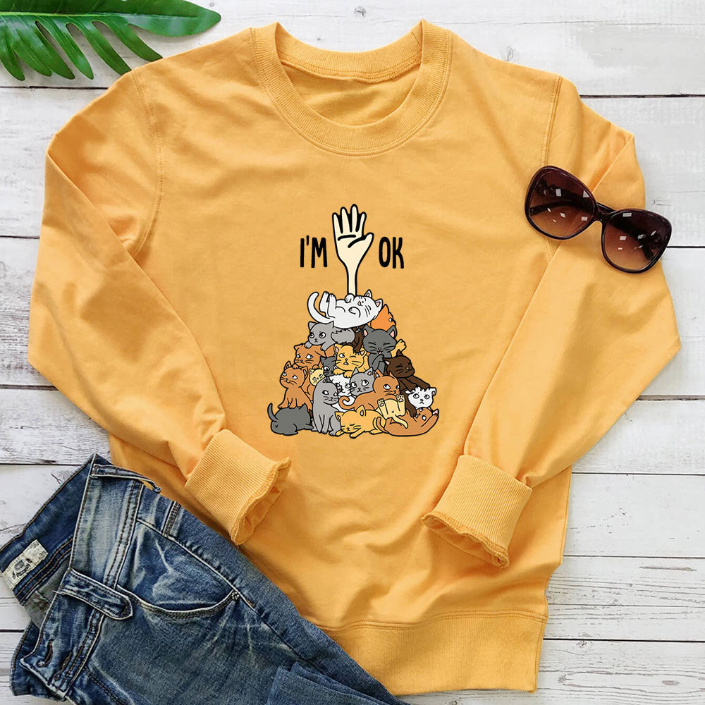 A pile of cat letter printed hoodies