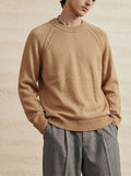 Round neck long sleeved pullover sweater