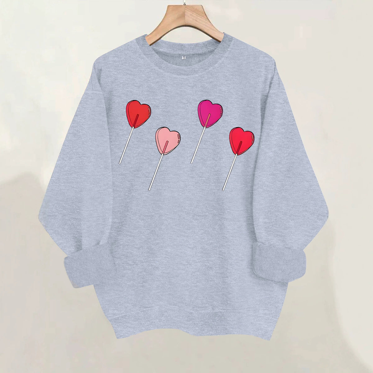 Pink heart-shaped balloon printed sweatshirt